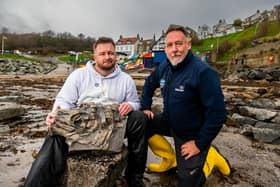 Mark Kemp, known as The Yorkshire Fossil Hunter, with Andy Monaghan, Community Safety Volunteer for the RNLI based at Staithes and Runswick Lifeboat Station with a 180 million-year-old Ichthyosaur fossil Mark found.
Picture by James Hardisty