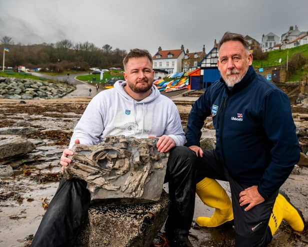 Mark Kemp, known as The Yorkshire Fossil Hunter, with Andy Monaghan, Community Safety Volunteer for the RNLI based at Staithes and Runswick Lifeboat Station with a 180 million-year-old Ichthyosaur fossil Mark found.
Picture by James Hardisty