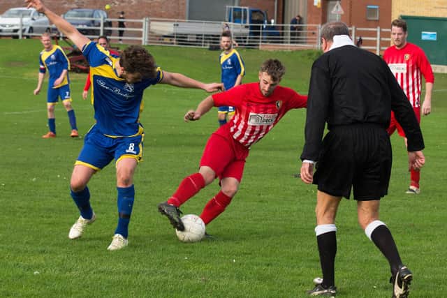 Tom Scales, red kit, scored twice as a sub for Edgehill Development in their 4-0 win at Fishburn Park Academy. 152280g