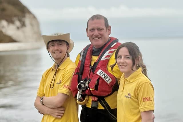 Karl Price with twin daughter and son Brooke and Blake. Image: RNLI/John Bates