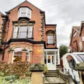 The impressive front view of the three-storey house on the tree-lined Royal Avenue.