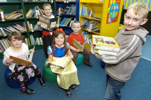 Pickering Infants School enjoying World Book Day in 2007 in their new library are pupils Laura Boyes, Matthew Bennett, Becky Collins, Brandon Cowton, and William Barnes.