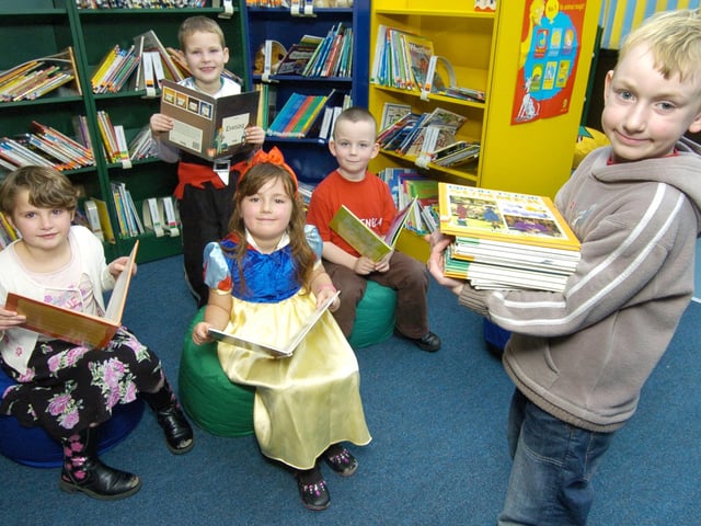 Pickering Infants School enjoying World Book Day in 2007 in their new library are pupils Laura Boyes, Matthew Bennett, Becky Collins, Brandon Cowton, and William Barnes.