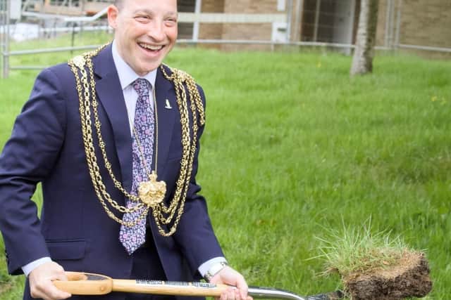 The Lord Mayor of Leeds, Councillor Dan Cohen, cuts the first sod on LJHA’s new affordable homes development which is due for completion next spring