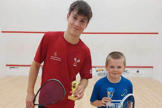 Trophy joy for Scarborough Squash Academy stars Ben Squires & Josh Mowat at Malton junior bronze tournament