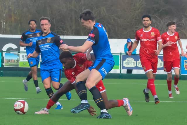 The in-form Destiny Nnenanya stretches to get the ball away from Pontefract. Photo by Ewan Cameron