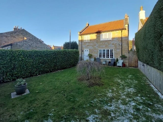 A second private garden with hedged boundaries.