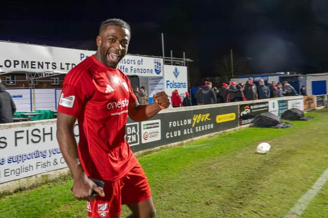 Kieran Weledji, who scored Boro's third goal in the 4-1 win at Radcliffe, celebrates with the away fans post-match. Photo by Chris Marson