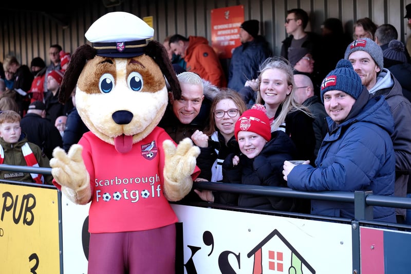 Sandy Sea Pup meets the Scarborough Athletic supporters before the 3-2 home win against Blyth Spartans.