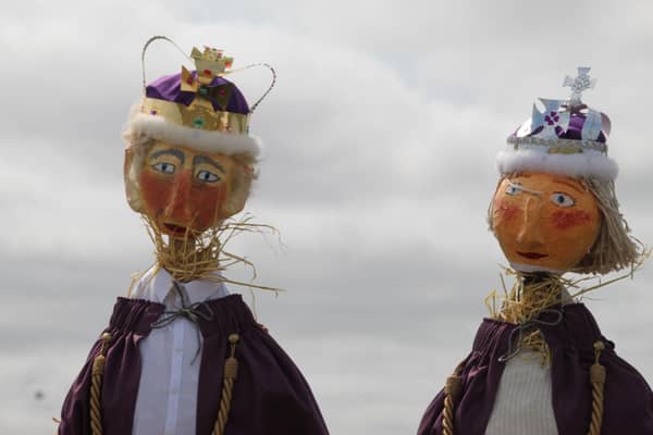 The King and Queen scarecrows with their hair made from sheep's wool.