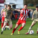 Boro players Harry Green, left, and Dom Tear, right, close in on a home player during their 2-0 loss at title-chasing Brackley. Photo by Zach Forster