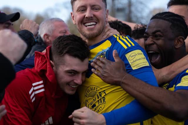 Richie Bennett celebrates putting Boro 1-0 up with teammates Luca Colville and Kieran Weledji. Photo by Wandering Photography