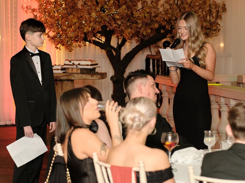 James Young and Elise Leadley prepare to deliver their speeches.