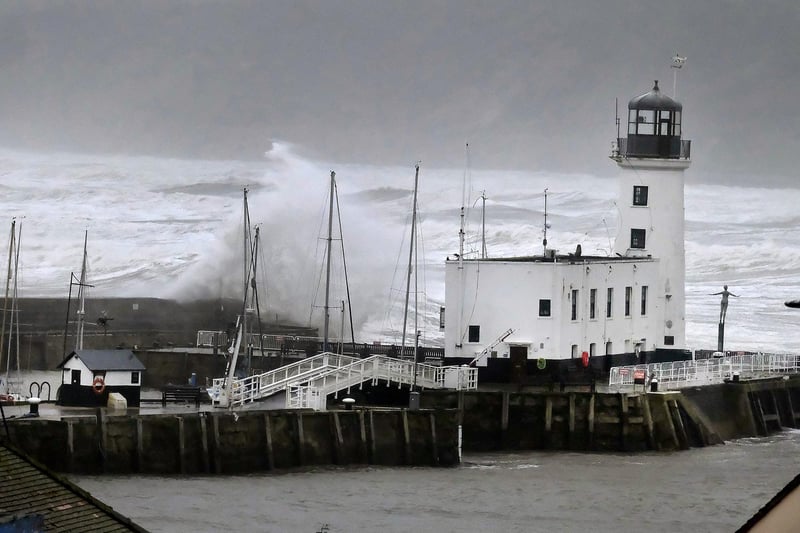 Swirling waves wash over Vincent Pier.