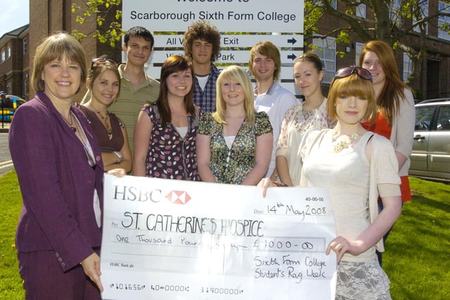 Students from Scarborough Sixth Form College present £1,000 to Saint Catherine's Hospice raised during Rag Week.