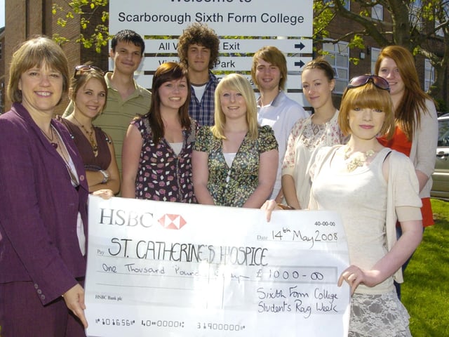 Students from Scarborough Sixth Form College present £1,000 to Saint Catherine's Hospice raised during Rag Week.