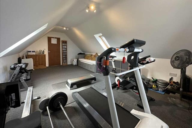 Versatile space is currently used for a home gym.