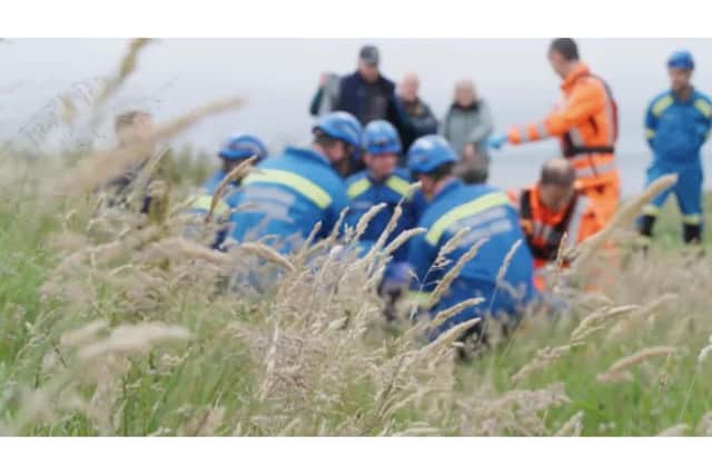 The coastguard helped to move Gillian to the waiting air ambulance