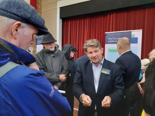 Europa CEO William Holland speaks with residents