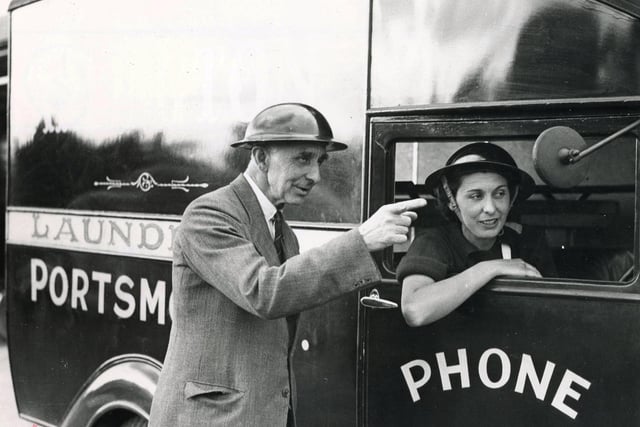 An ambulance driver gets directions in a requisitioned laundry van at Cosham in 1939. The News PP530