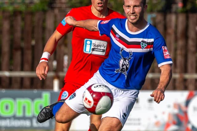 Adam Gell in action for Town against Warrington Rylands.