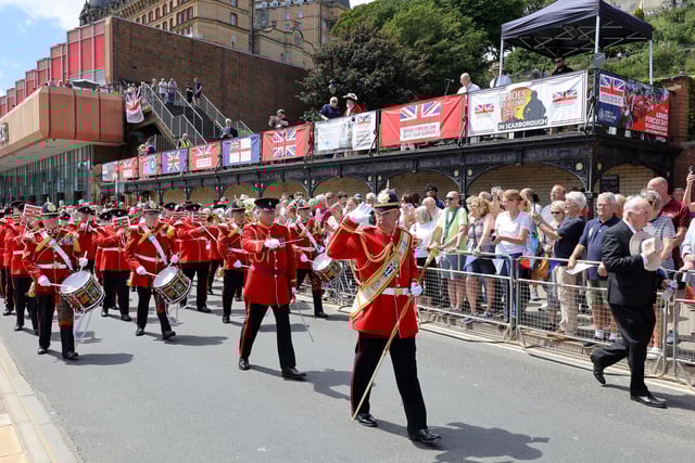 The band leader gives the salute