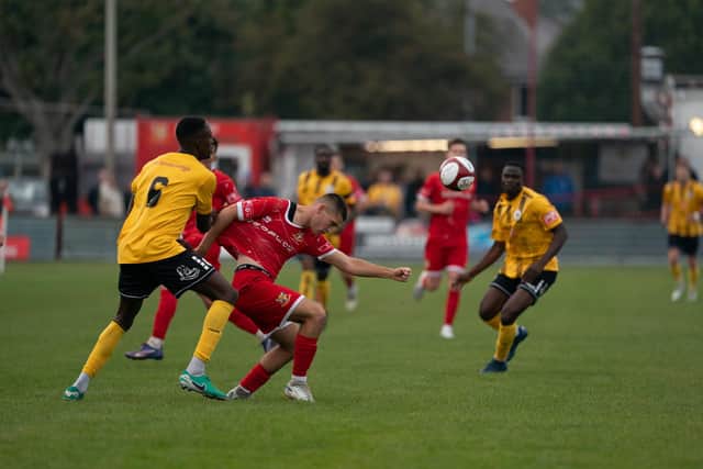 Bridlington Town (red kit) in action during their 0-0 draw at home to Bradford Park Avenue. Photo by Wandering Photography