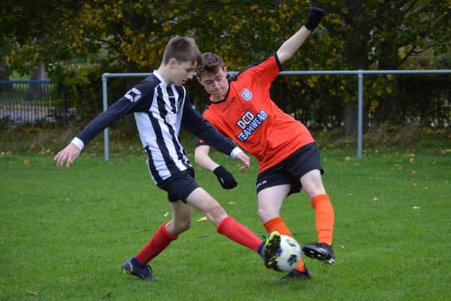 Heslerton Under-16s, orange kit, claimed a superb win on the road at Dunnington on Sunday