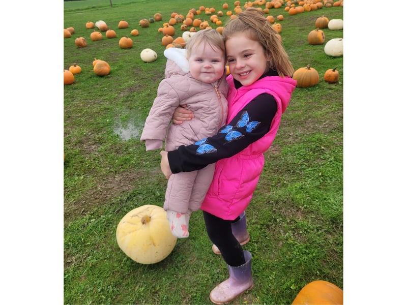 Here are Blossom and Lily- Rose from Scarborough enjoying themselves while pumpkin picking.