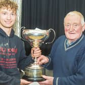 The Whitby Sea Anglers Association Open winner Ryan Collinson with Chairman William Atkinson. PHOTO BY PETER HORBURY