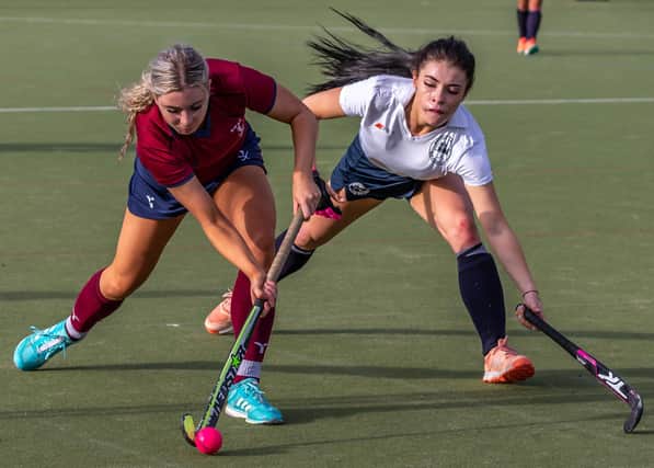 Whitby Hockey Club's Millie Storr battles for the ball with Newcastle Medics PHOTOS BY BRIAN MURFIELD