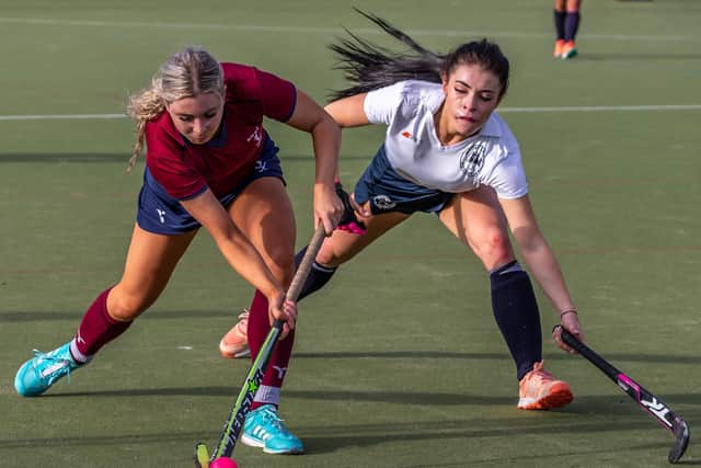 Whitby Hockey Club's Millie Storr battles for the ball with Newcastle Medics PHOTOS BY BRIAN MURFIELD