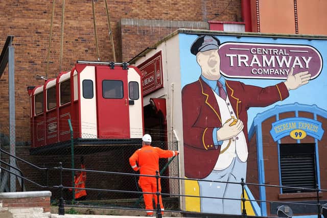 A large crane was used to winch the carriages back into place in May, after they left the seafront for the first time.