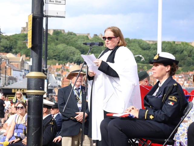 Addressing the crowds.
