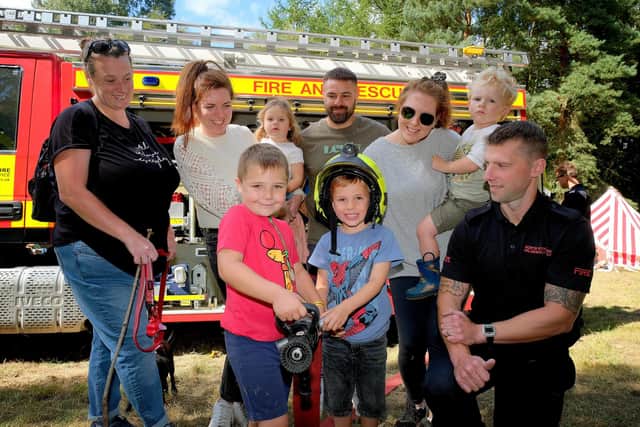 Families enjoy meeting Firefighter John Staniforth at the event