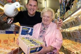 Miles Jackson with Mum Dawn who runs the store with the special seagull-flavoured rock.