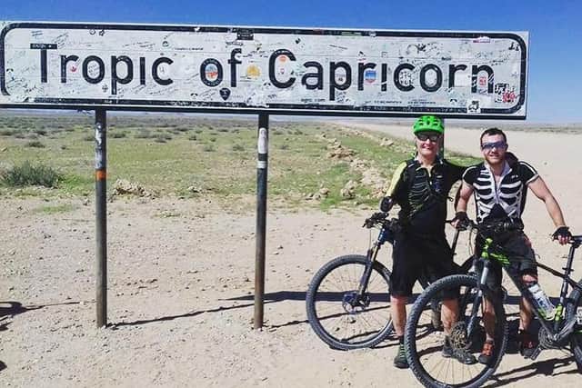 Mr Heaps with son Ollie at the Tropic of Capricorn