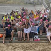 Participants of the sea swim race put on a brave face after a thick sea fret in Sandsend caused the event to be cancelled during 2022 Whitby Regatta.  
Picture Tony Johnson.