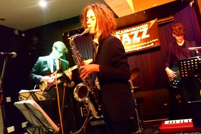 Saxophonist Murray Robinson, performing in a new 'chordless' trio setting influenced by classic Sonny Rollins trio recordings