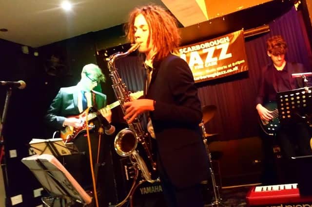 Saxophonist Murray Robinson, performing in a new 'chordless' trio setting influenced by classic Sonny Rollins trio recordings