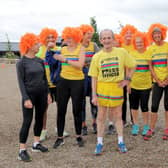 Mick Thompson, front, celebrates his landmarks at the North Yorkshire Water Park Parkrun