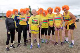 Mick Thompson, front, celebrates his landmarks at the North Yorkshire Water Park Parkrun