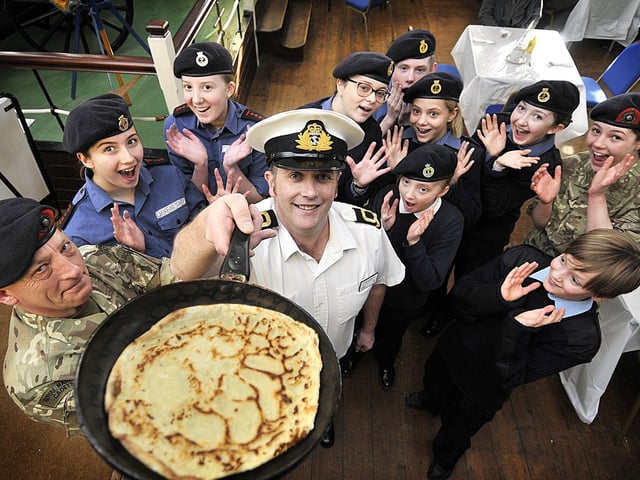 Pancakes ready made by the Sea Cadets all in aid of charity Sgt James Coomber and Sub Lt Gareth Davies and the excited sea cadets