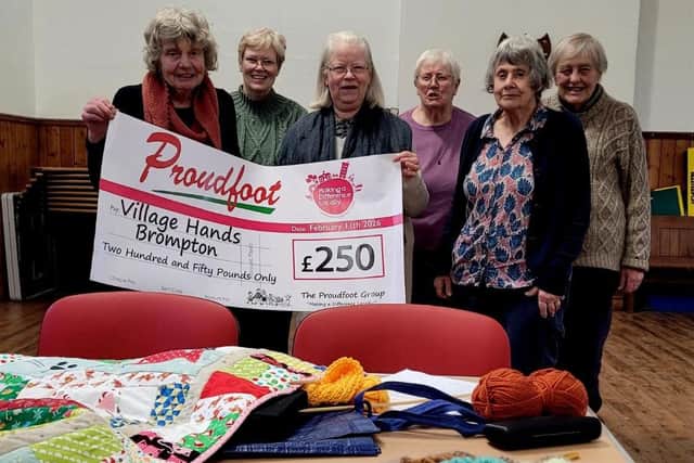 The £250 donation will help the group purchase materials for its charity crafting projects