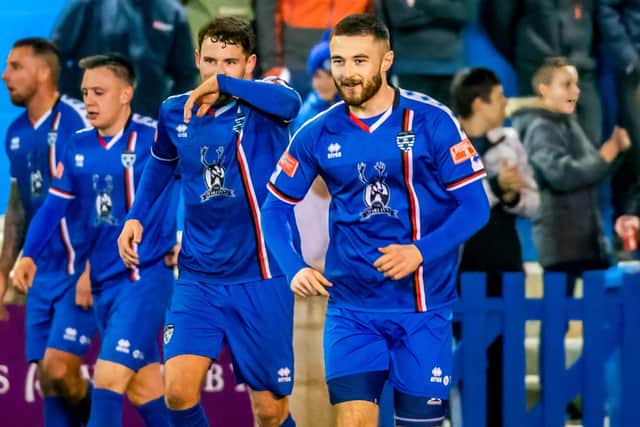 Brad Fewster celebrates making it 2-0 to the Blues