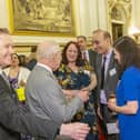 King Charles converses with Louise French from the Scarborough News - Image credit Ian Jones.