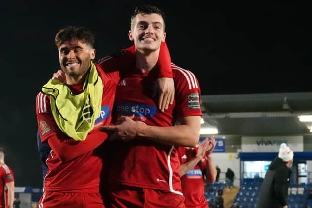 Fin Barnes and Luca Colville celebrate the win for Boro at Curzon Ashton on Tuesday night. PHOTO BY CHRIS MARSON