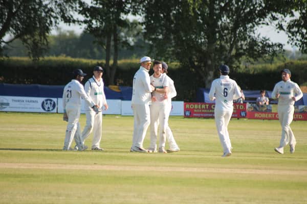 Freddie Collins is congratulated by his Woodhouse teammates against Driffield before they were pipped at the post by the visitors.