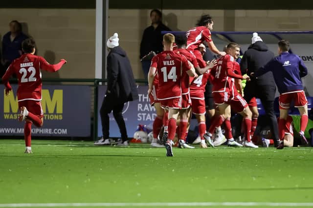 Boro celebrate Lewis Maloney's late winner at Oxford City. Photos by Top-pic photography