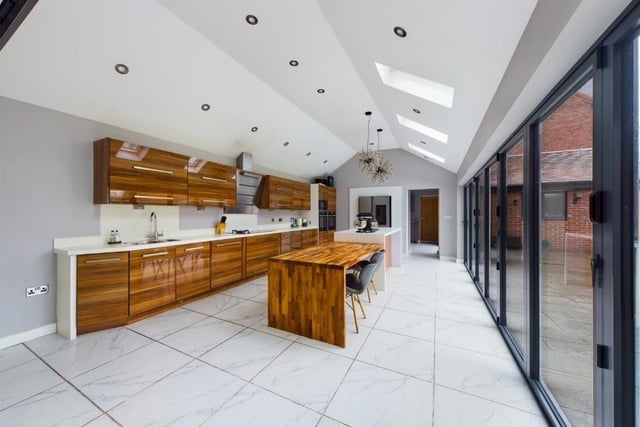 An alternative view of the kitchen with a central island.